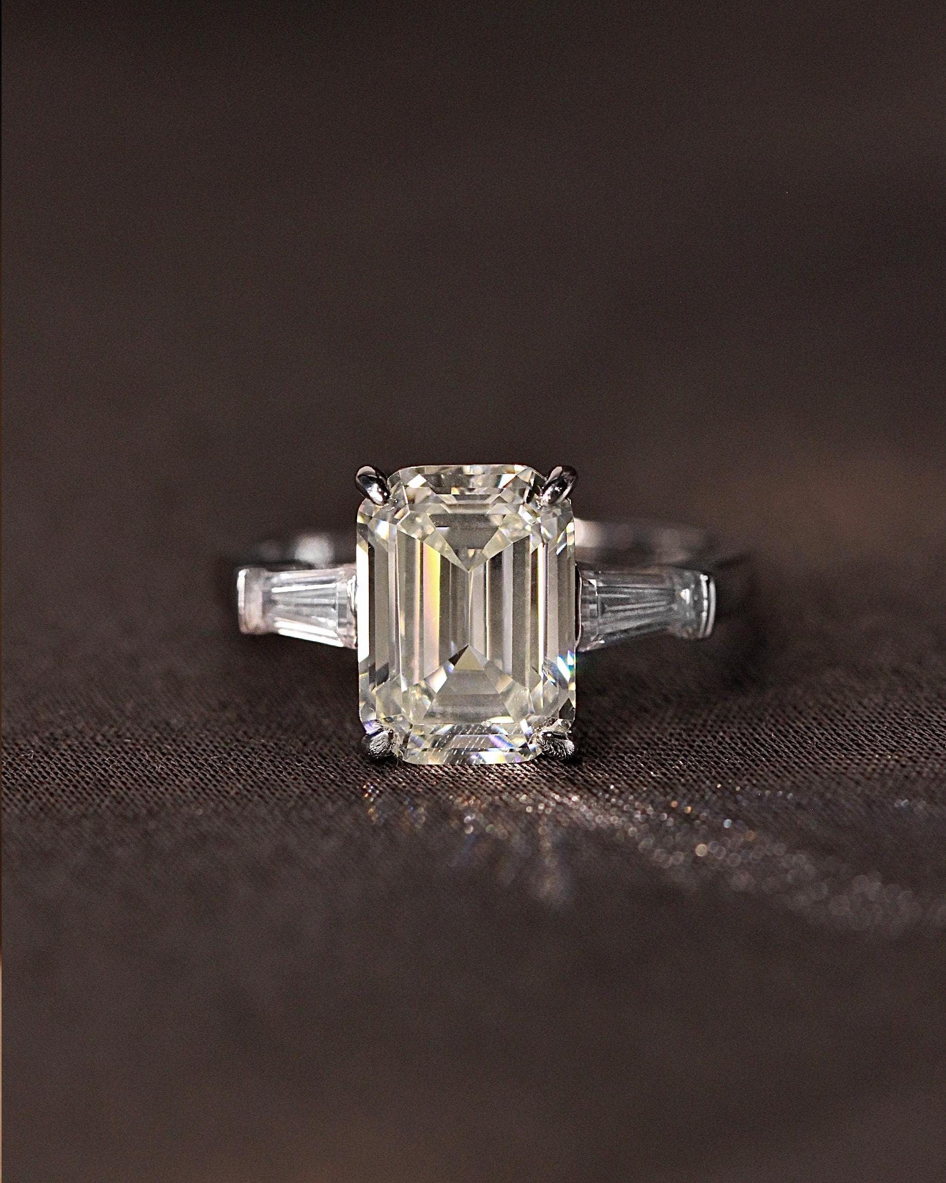 Ivory Emerald Cut Ring. Rhodium-plated Sterling Silver 925 + High Carbon Diamonds.