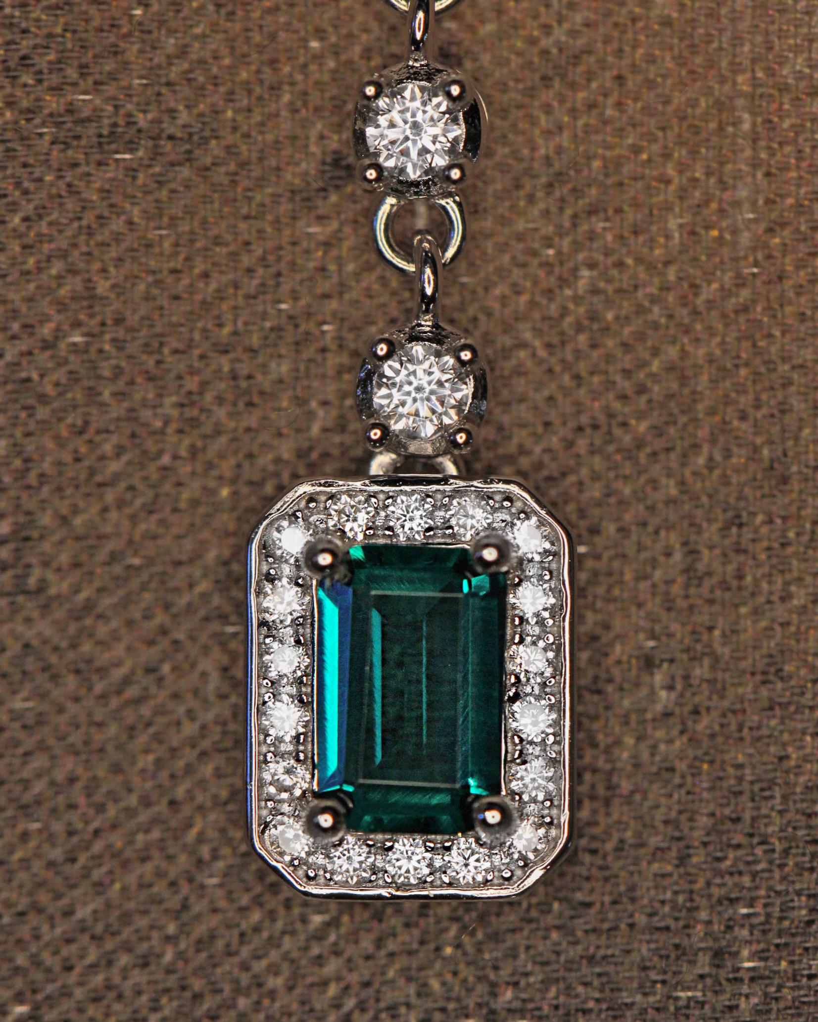Emerald Dangle Earrings: Sterling Silver 925, High Carbon Diamonds.