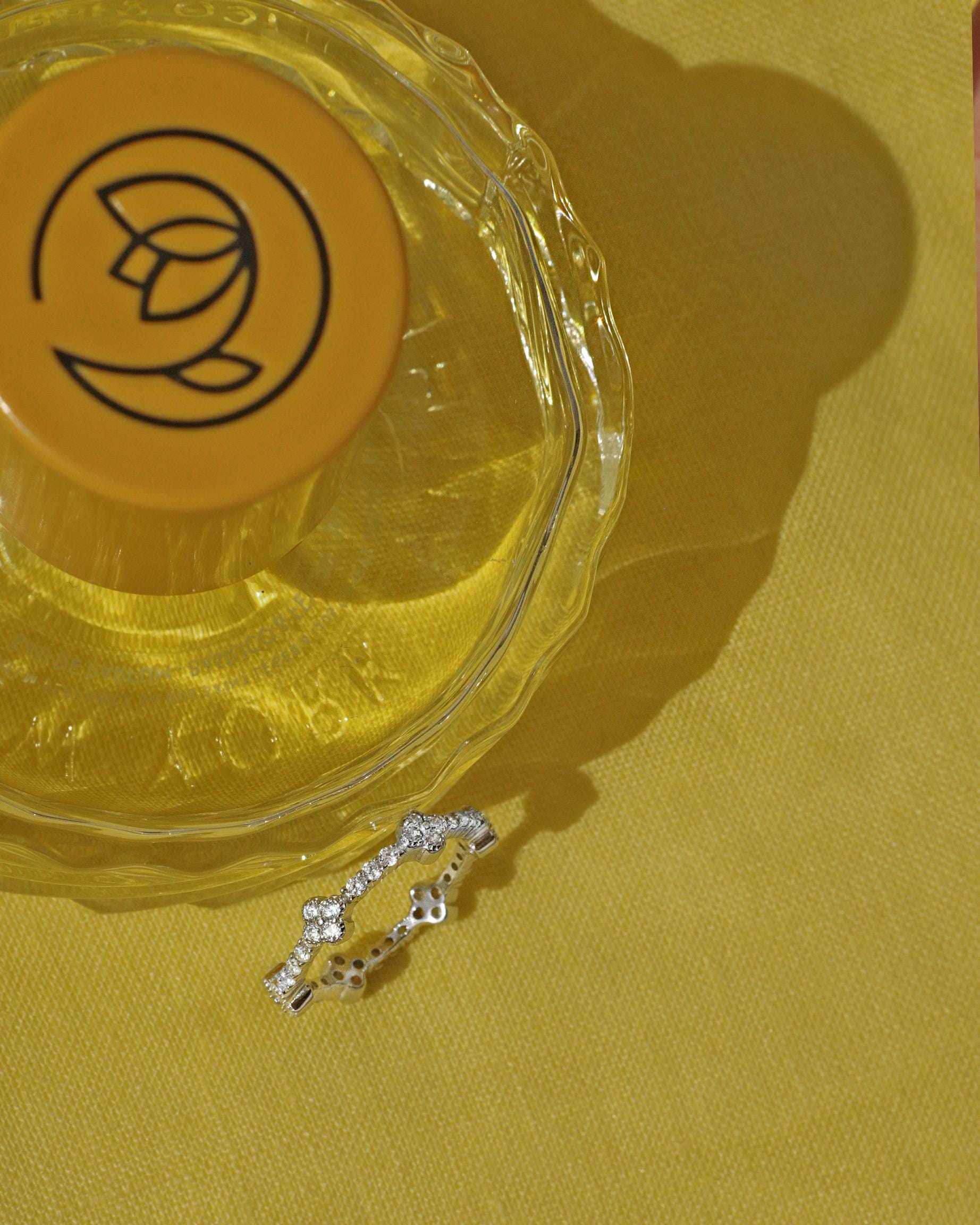 Lucky Clover Ring: Rhodium Plated Sterling Silver with High Carbon Diamonds.