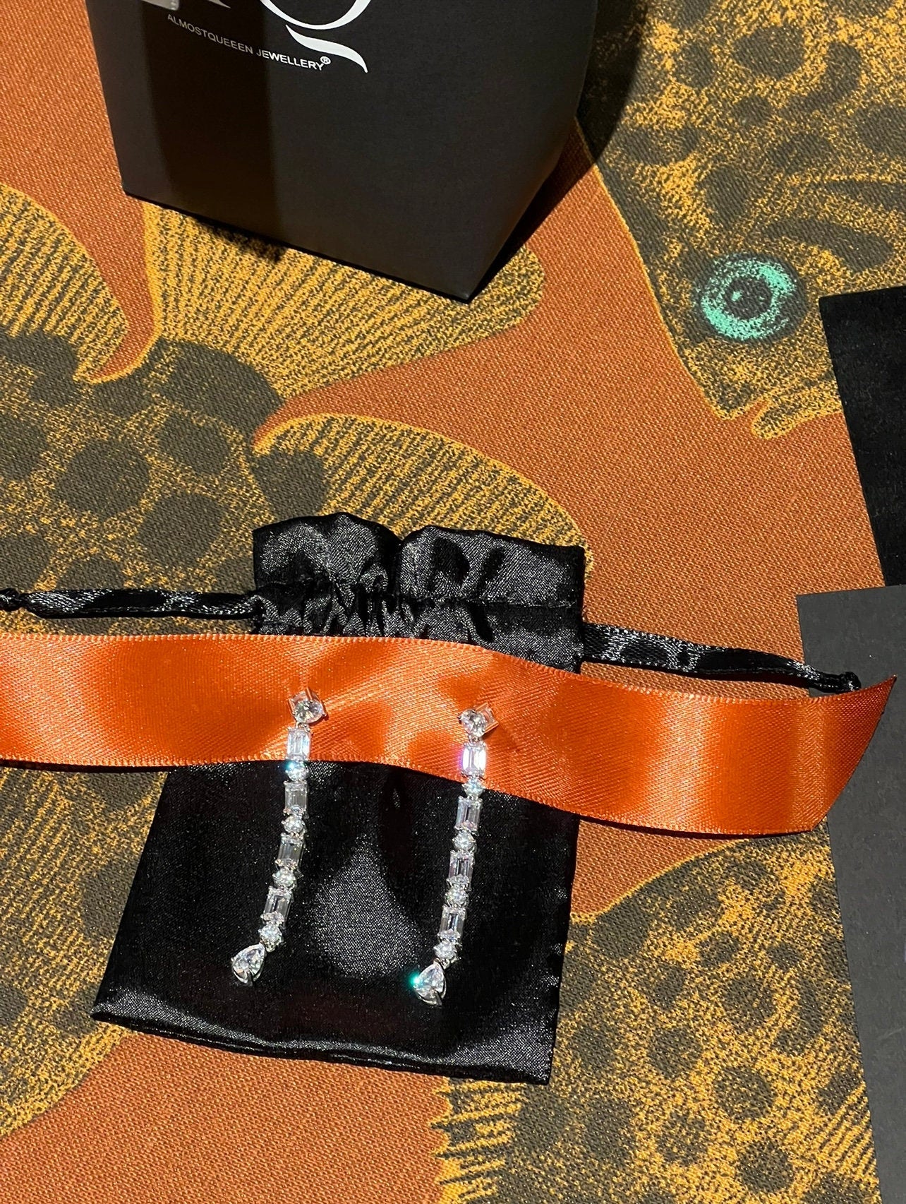 Long Multi-Shape Statement Earrings: Emerald, Diamond & Pear Cuts.