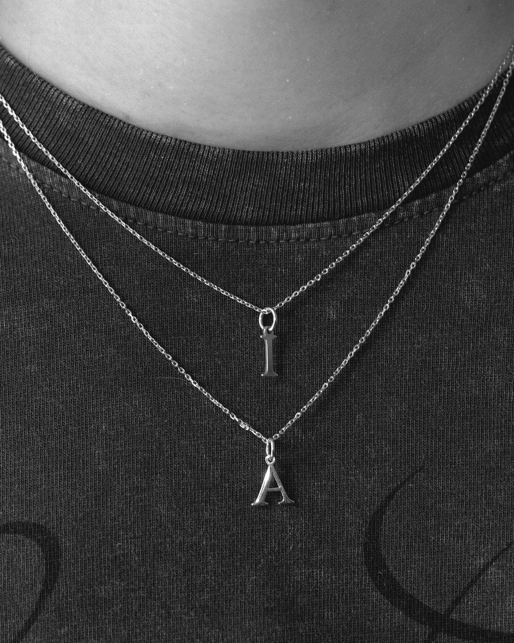 Tiny Silver Letter: Rhodium-Plated Sterling Silver 925