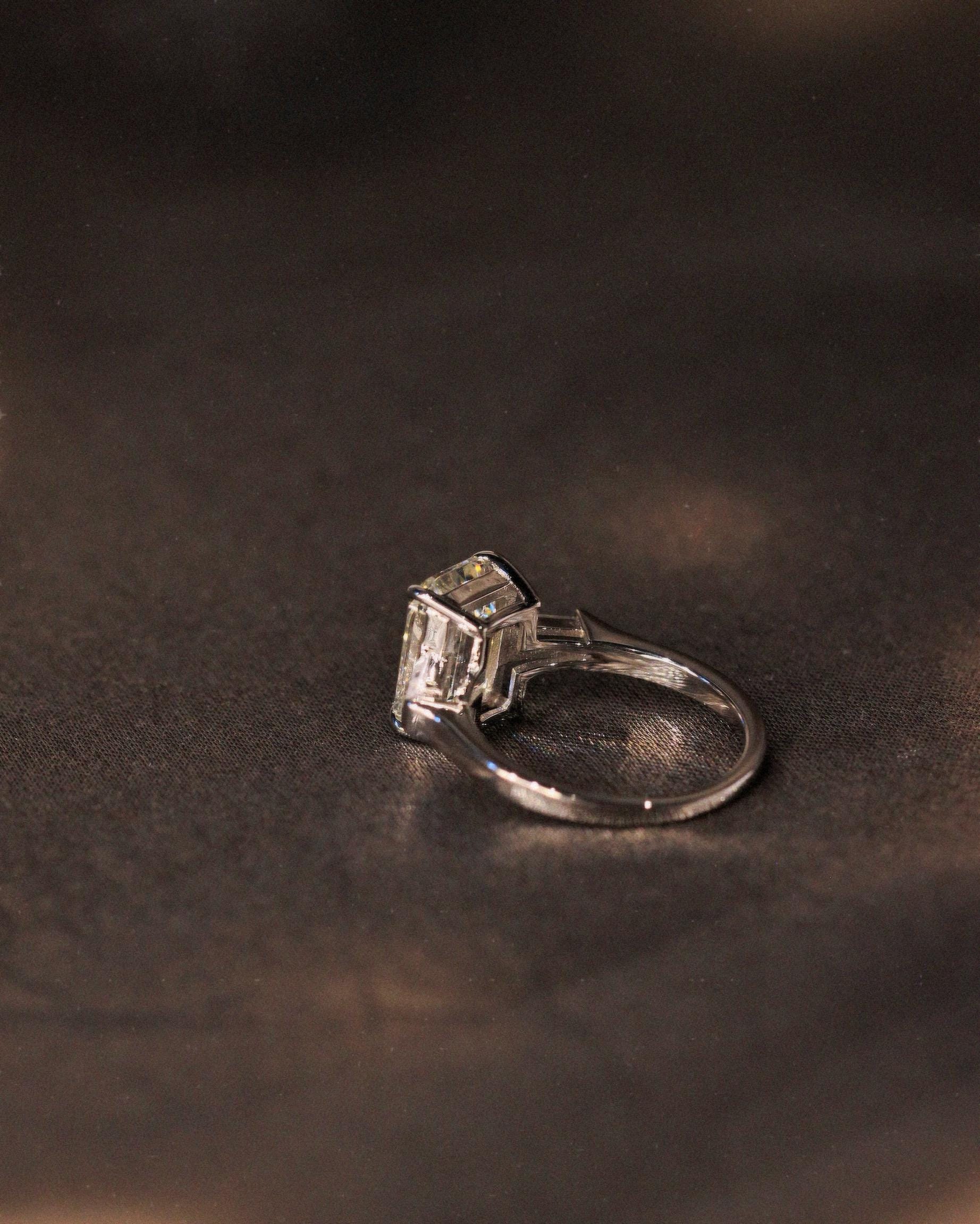 Ivory Emerald Cut Ring. Rhodium-plated Sterling Silver 925 + High Carbon Diamonds.