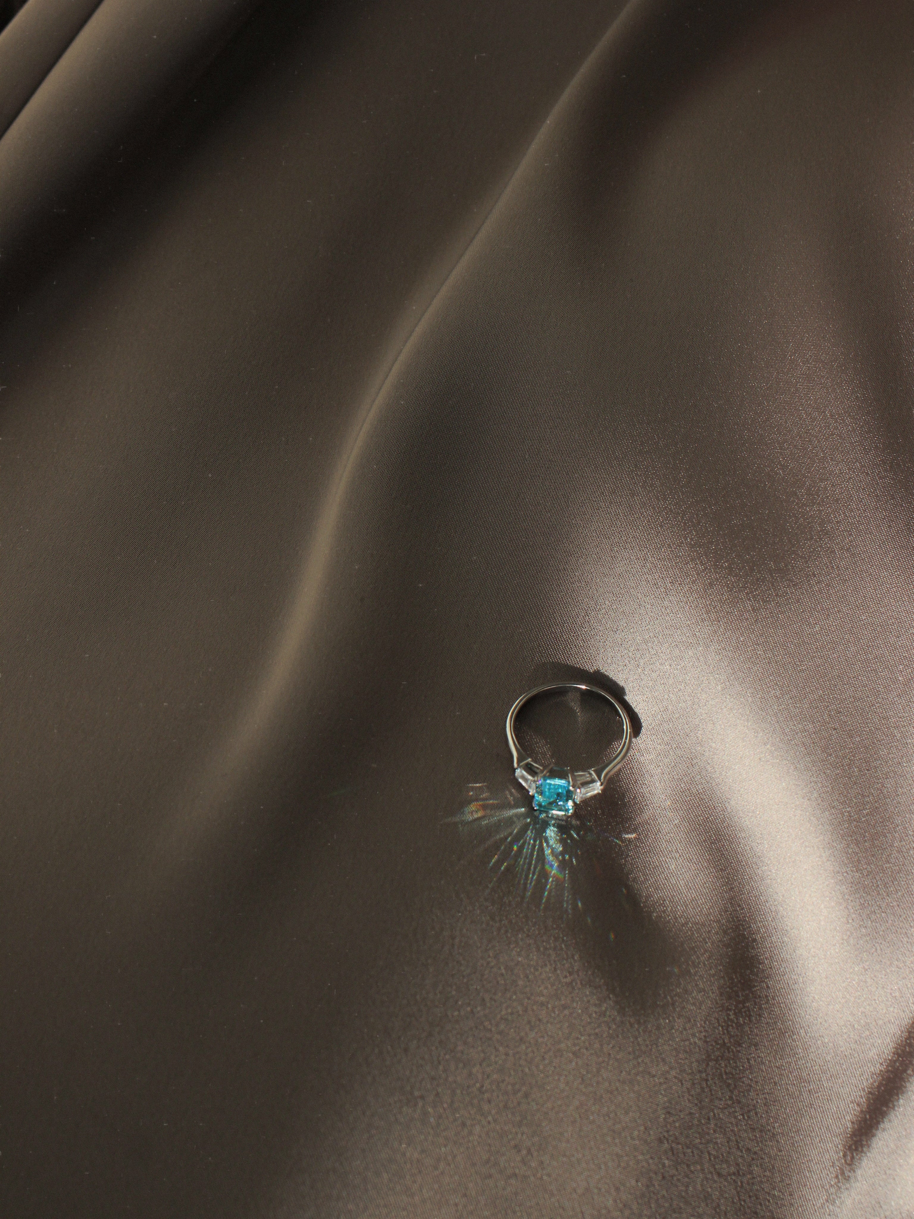 Light Blue Emerald Cut Ring. Rhodium-plated Streling Silver 925.