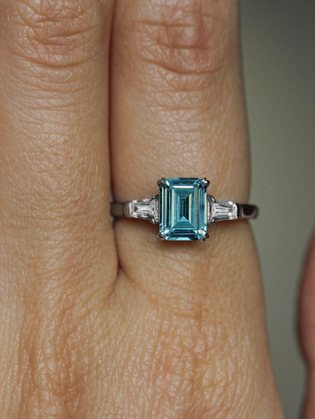 Light Blue Emerald Cut Ring. Rhodium-plated Streling Silver 925.