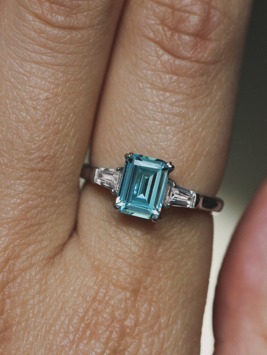Light Blue Emerald Cut Ring. Rhodium-plated Streling Silver 925.