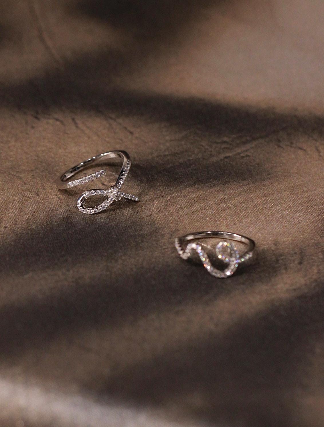 Wave Ring. Rhodium-plated Sterling Silver 925 + High Carbon Diamonds.