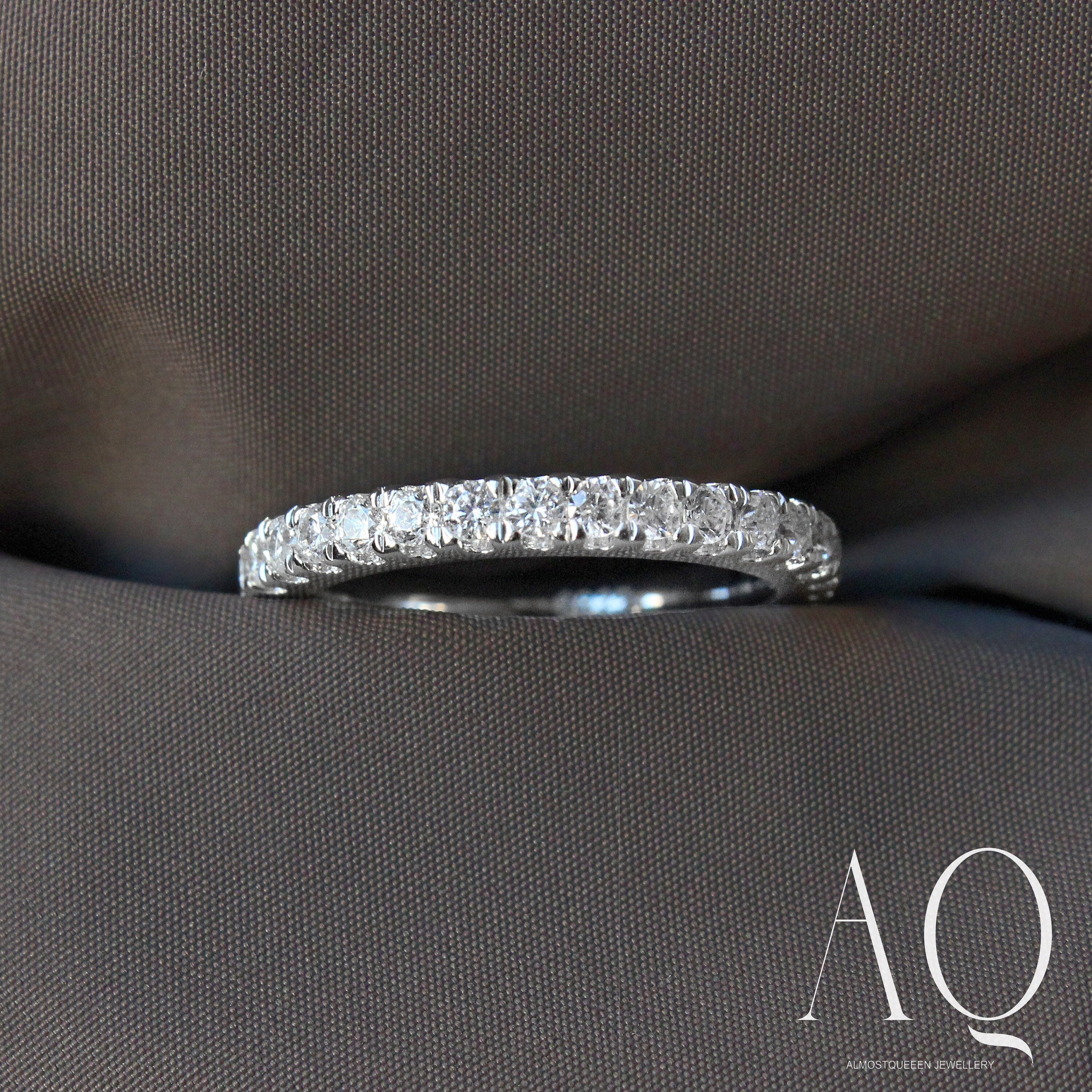 Sterling Silver Eternity Ring: Thin Band with High Carbon Diamonds.