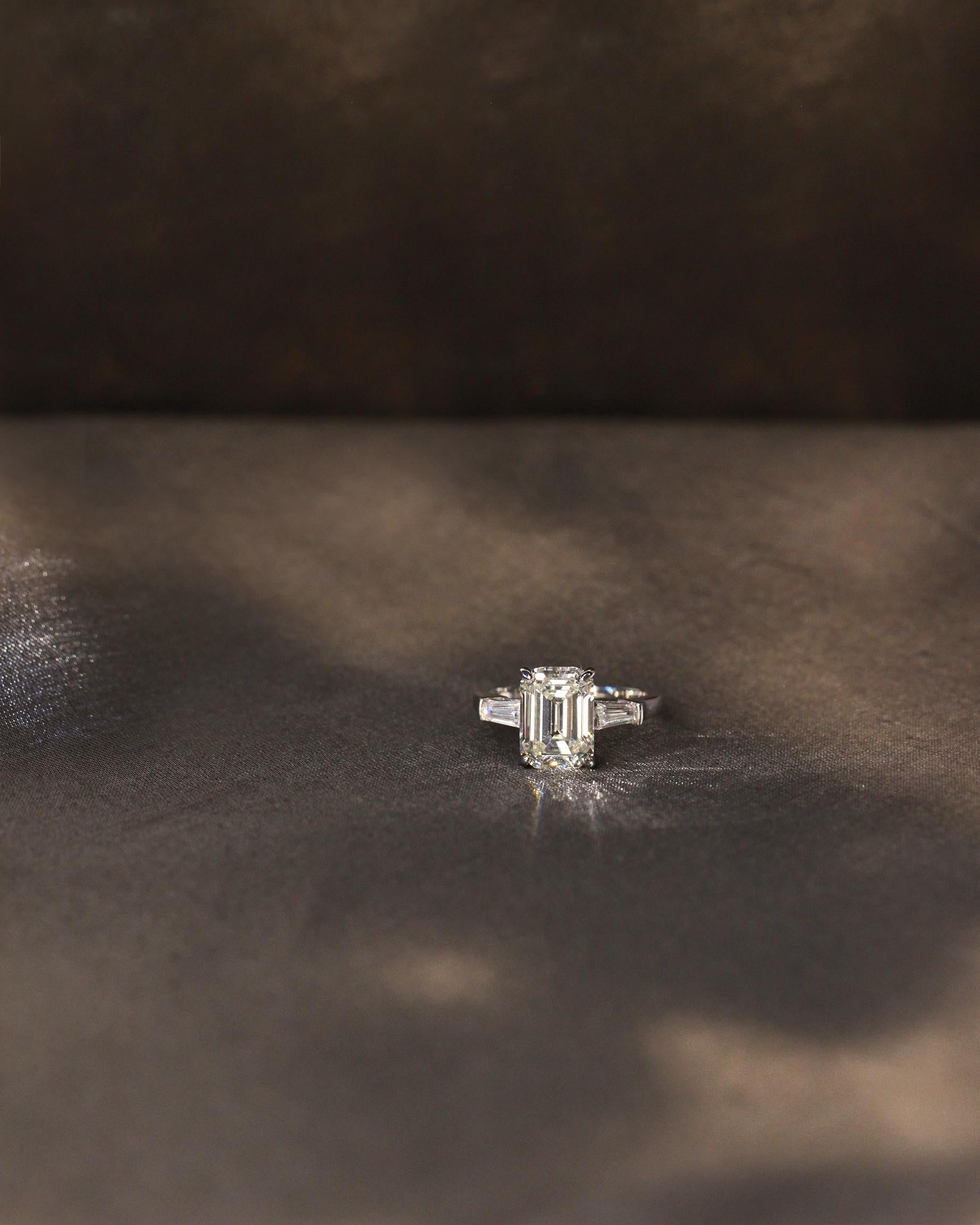 Ivory Emerald Cut Ring. Rhodium-plated Sterling Silver 925 + High Carbon Diamonds.