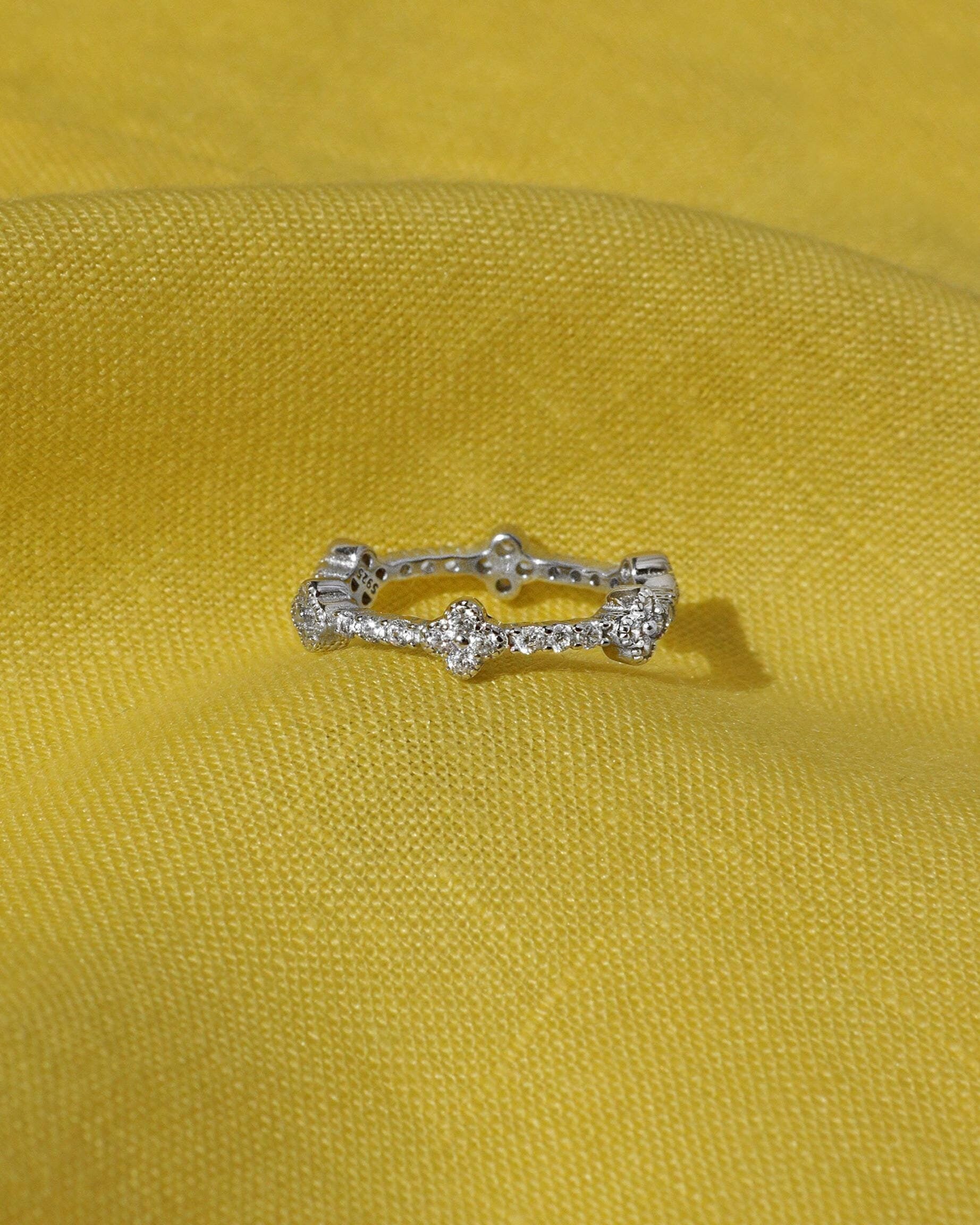 Lucky Clover Ring: Rhodium Plated Sterling Silver with High Carbon Diamonds.
