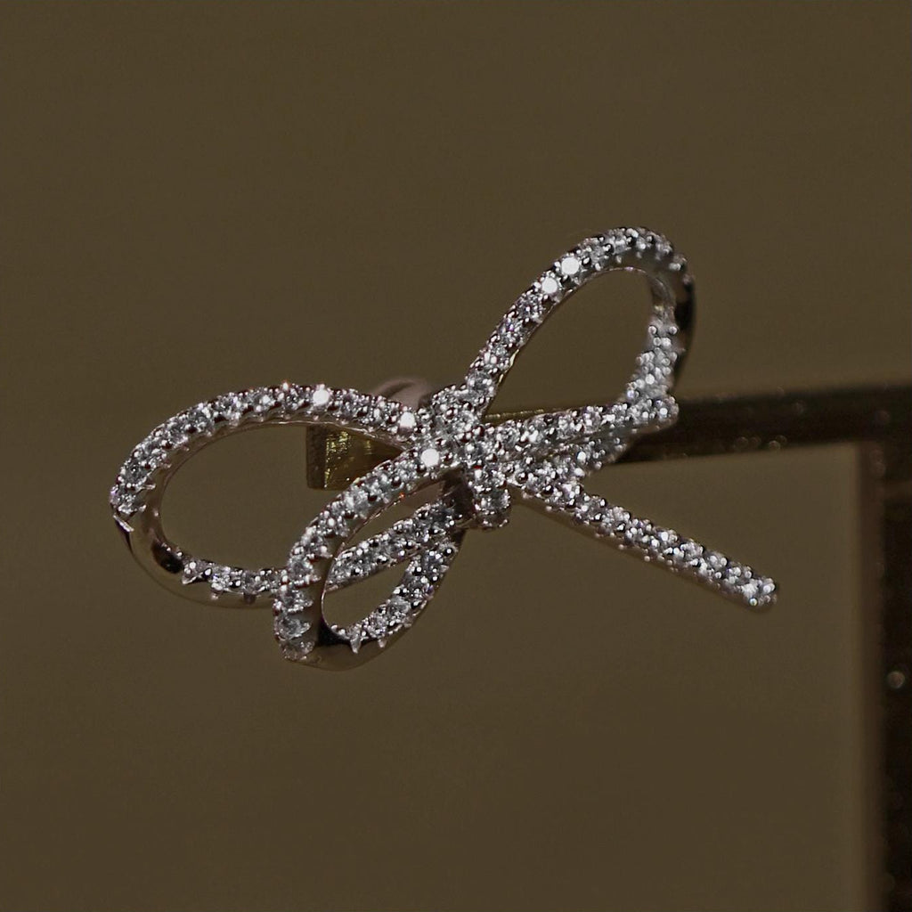 Sparkling Bows. Aesthetic, statement earrings. Rhodium Plated Sterling Silver 925 + High Carbon Diamonds.