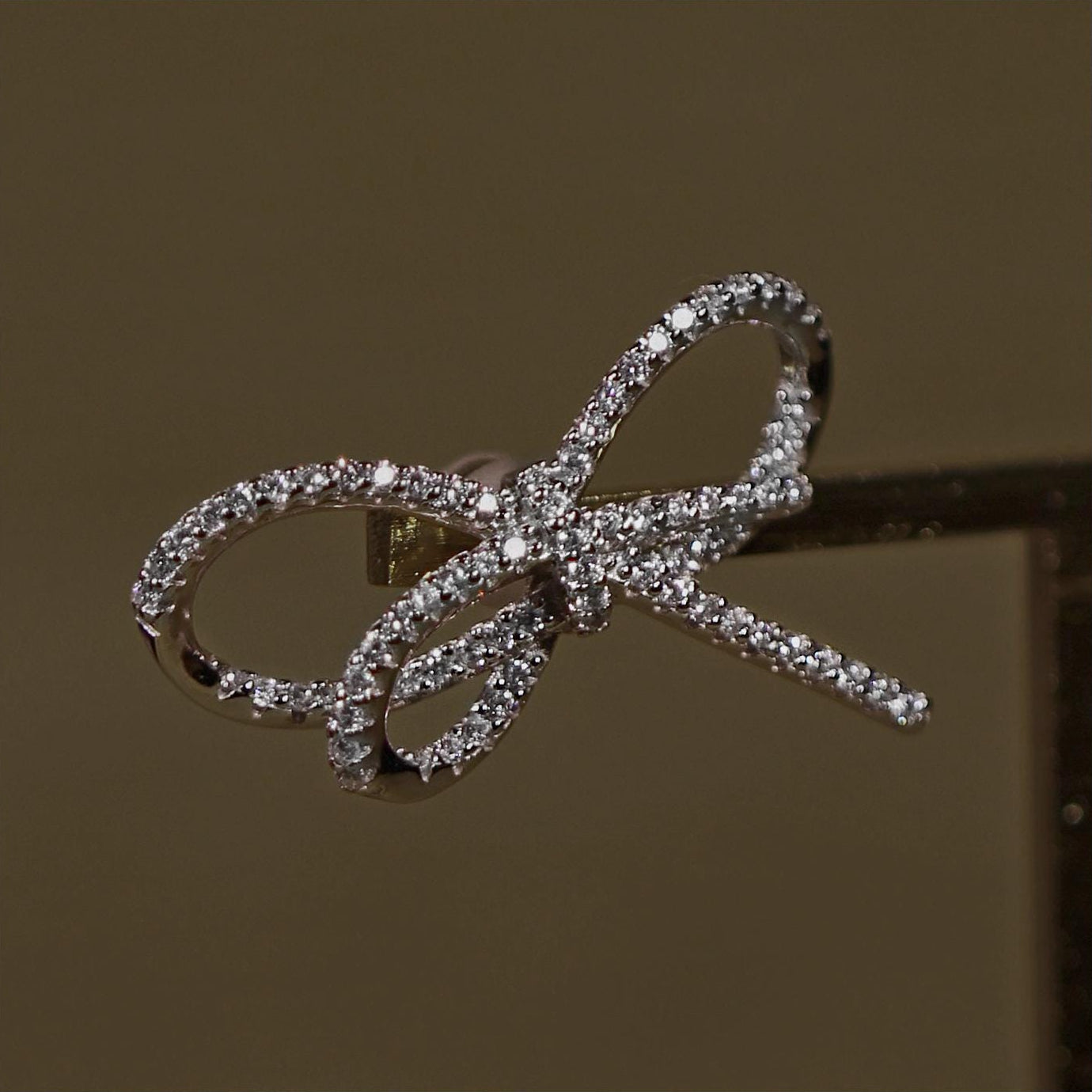 Sparkling Bows. Aesthetic, statement earrings. Rhodium Plated Sterling Silver 925 + High Carbon Diamonds.