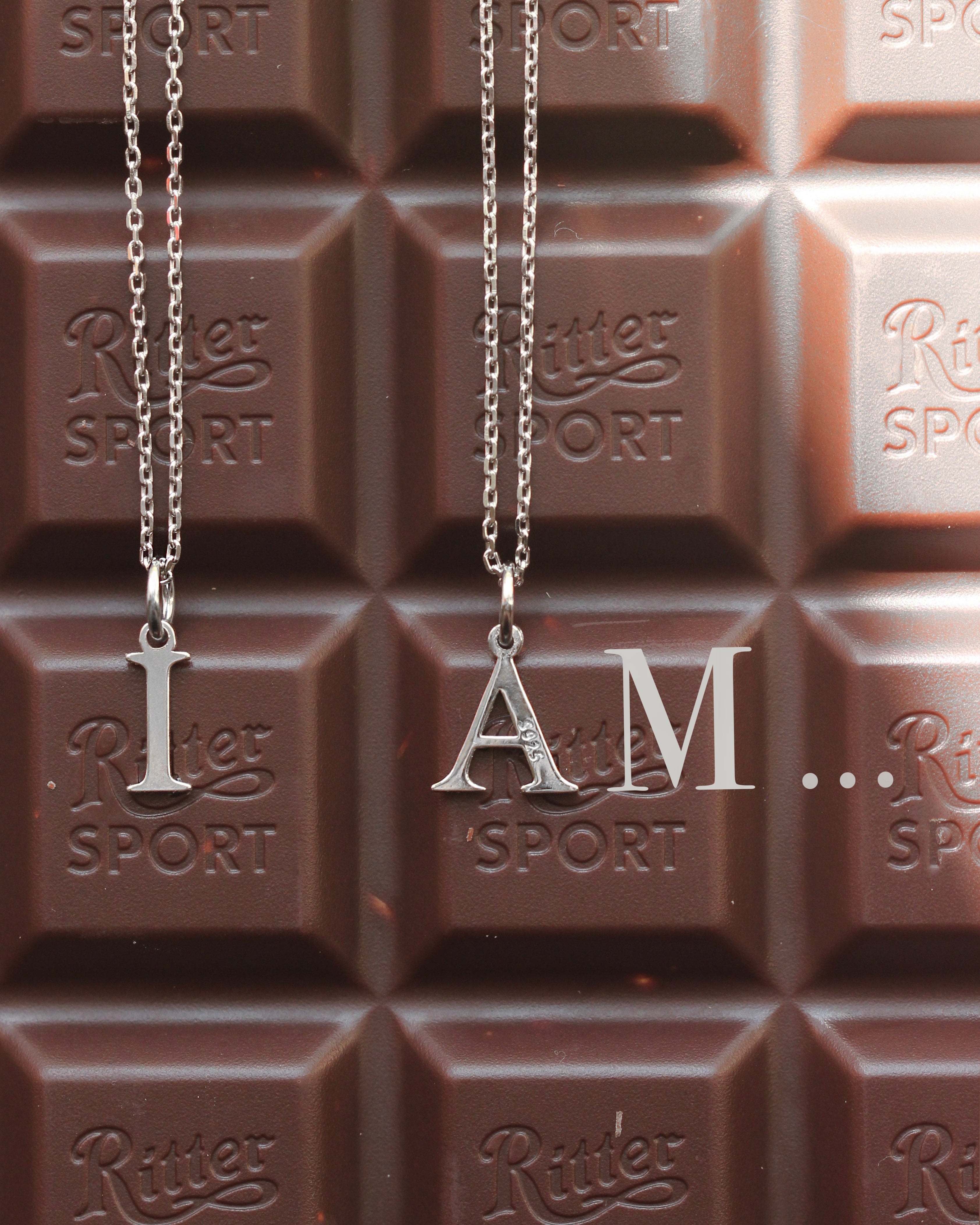 Tiny Silver Letter: Rhodium-Plated Sterling Silver 925